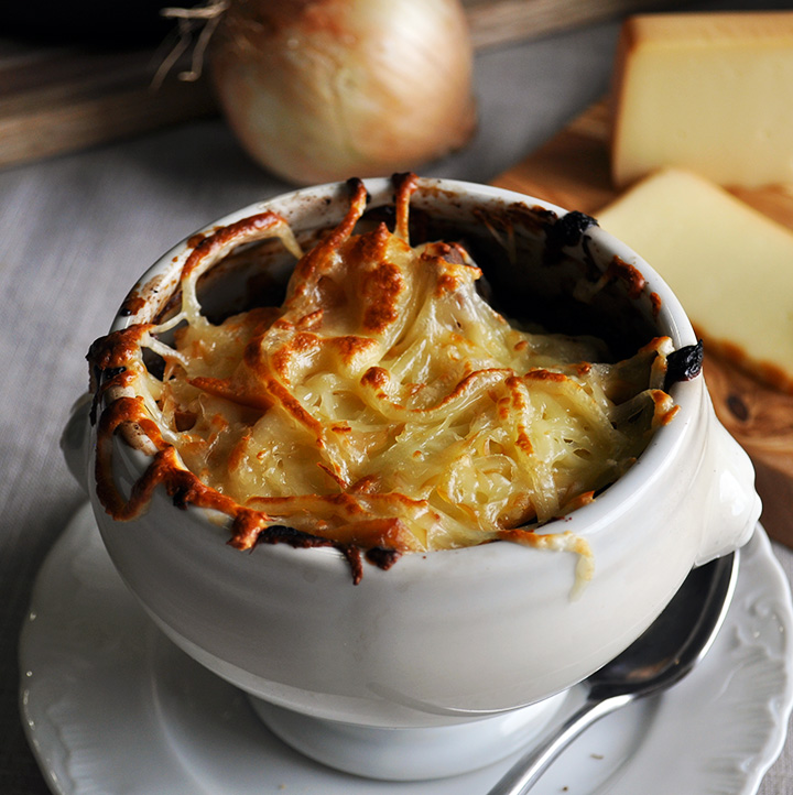A bowl of crock pot French onion soup.
