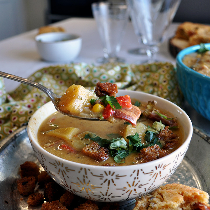 A spoonful of Potato Corn Chowder with Bacon and Roasted Poblano Peppers