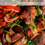 Sheet Pan Cajun Chicken with Vegetables and Cheesy Grits