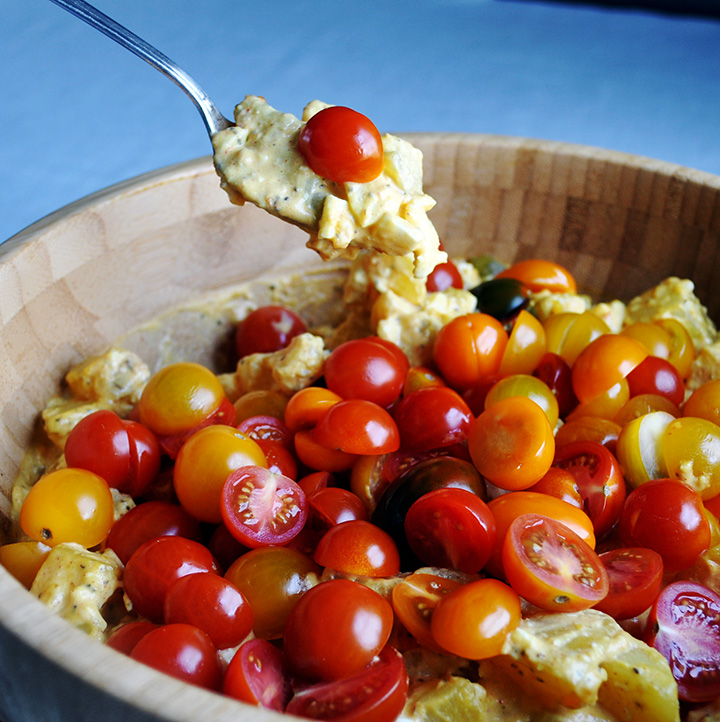 Mustard potato salad with fresh cherry tomatoes.