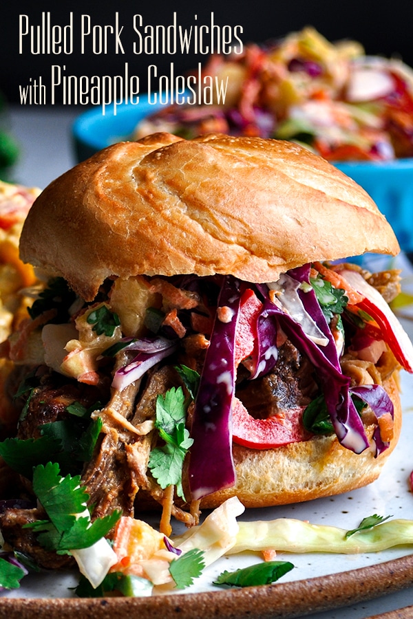 A pulled pork sandwich with pineapple coleslaw.