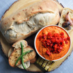 Roasted Red Pepper Hummus with bread and grilled vegetables