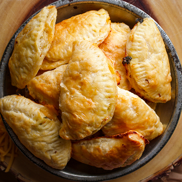 A tray of ham and cheese hand pies.