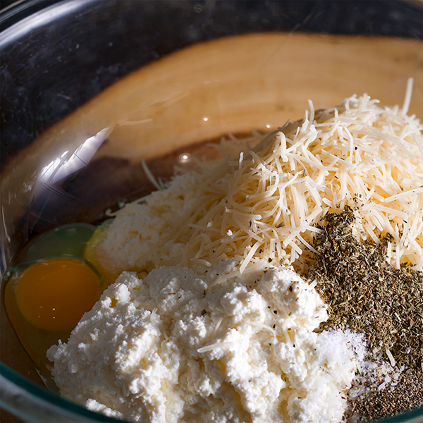 Ingredients for the ricotta cheese layer of classic homemade lasagna. 
