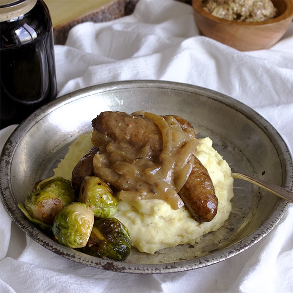 Guinness cooked bangers and mash with onion gravy