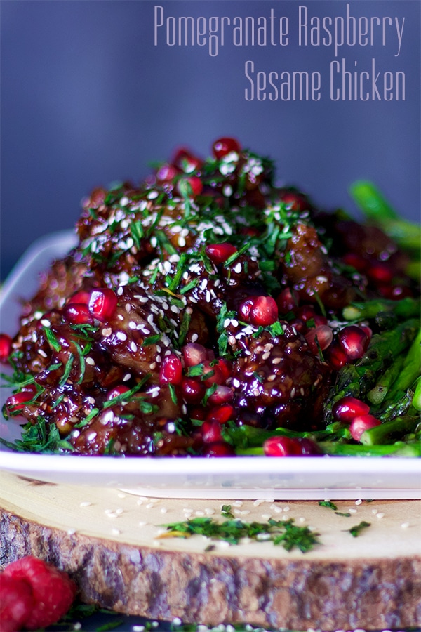 Pomegranate Raspberry Sesame Chicken with rice and asparagus