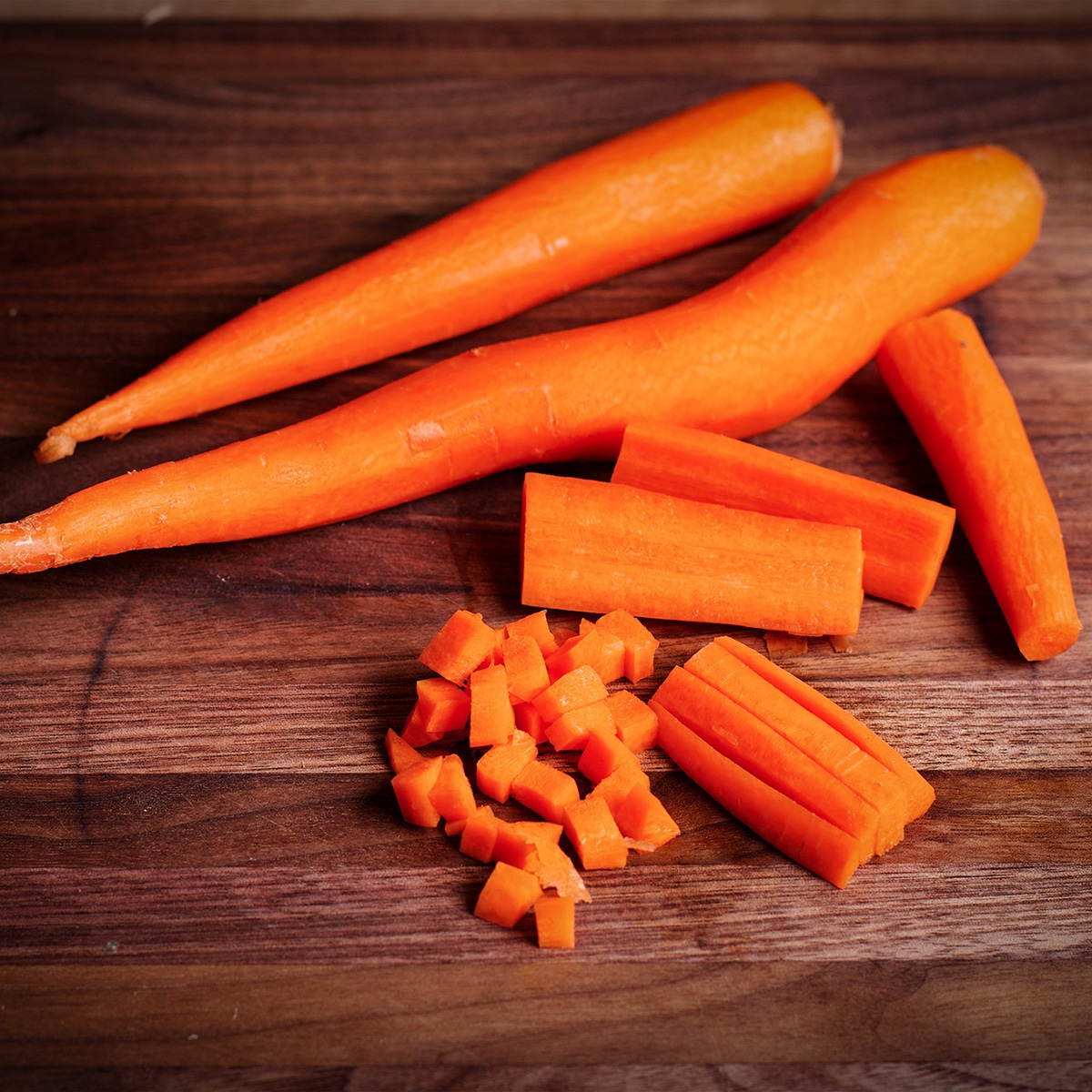 How to chop a carrot into sticks then into small pieces.