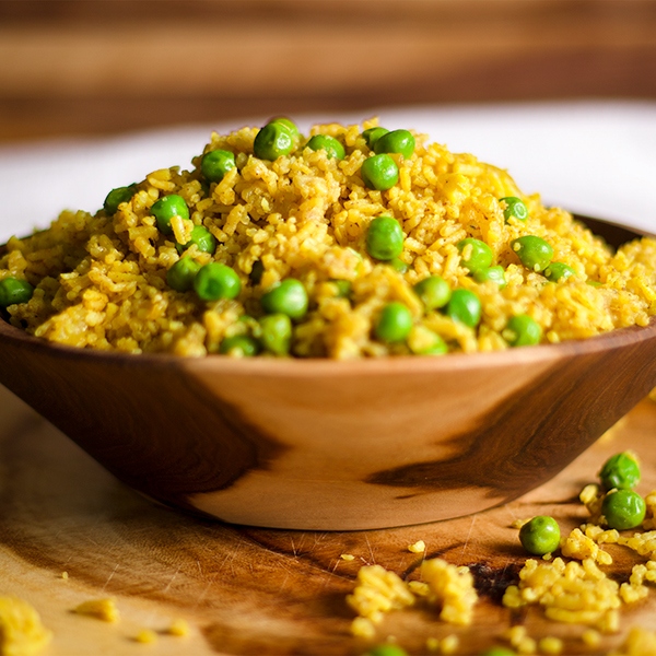 A bowl of Indian Rice with peas.