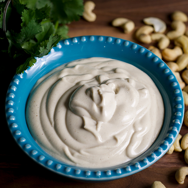 A bowl of Vegan Sour Cream made with pureed cashews.