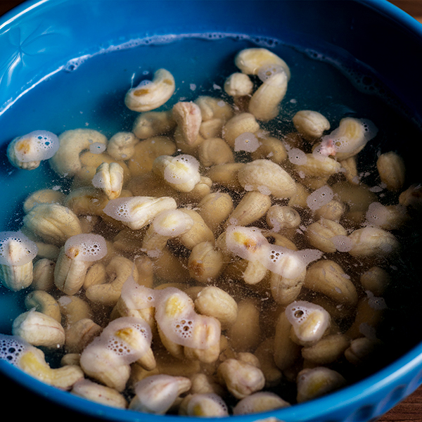 Cashews soaking in a bowl of water before being pureed to make Vegan Sour Cream.