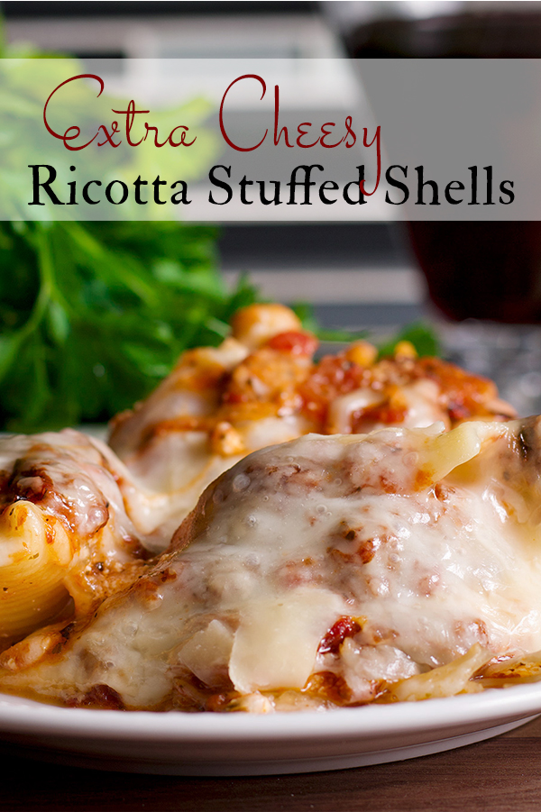 A plate of Cheesy Ricotta Stuffed Shells with Marinara Sauce.