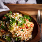 A bowl of rice and Crispy Coconut Lime Chicken.