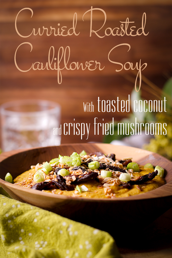 A bowl of Curried Cauliflower Soup with Toasted Coconut and Crispy Fried Mushrooms.