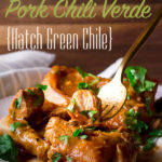 Taking a bite of homemade pork green chili with hatch chiles.