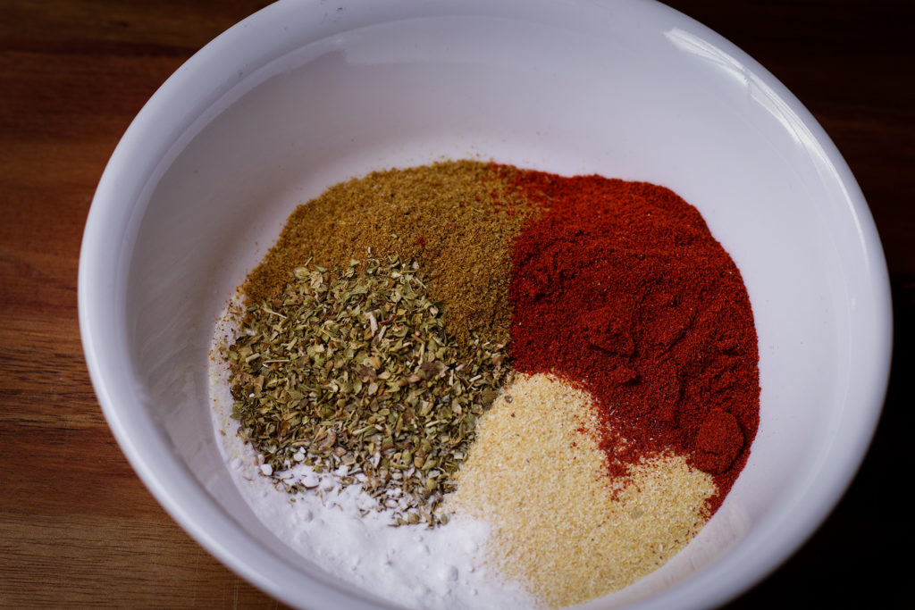 A bowl of dried spices to add to Instant Pot Beans