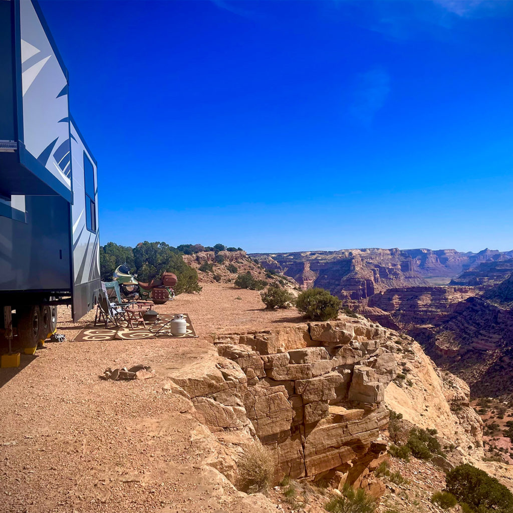 Our 5th wheel parked on the edge of The Little Grand Canyon on BLM land called The Wedge Overlook.