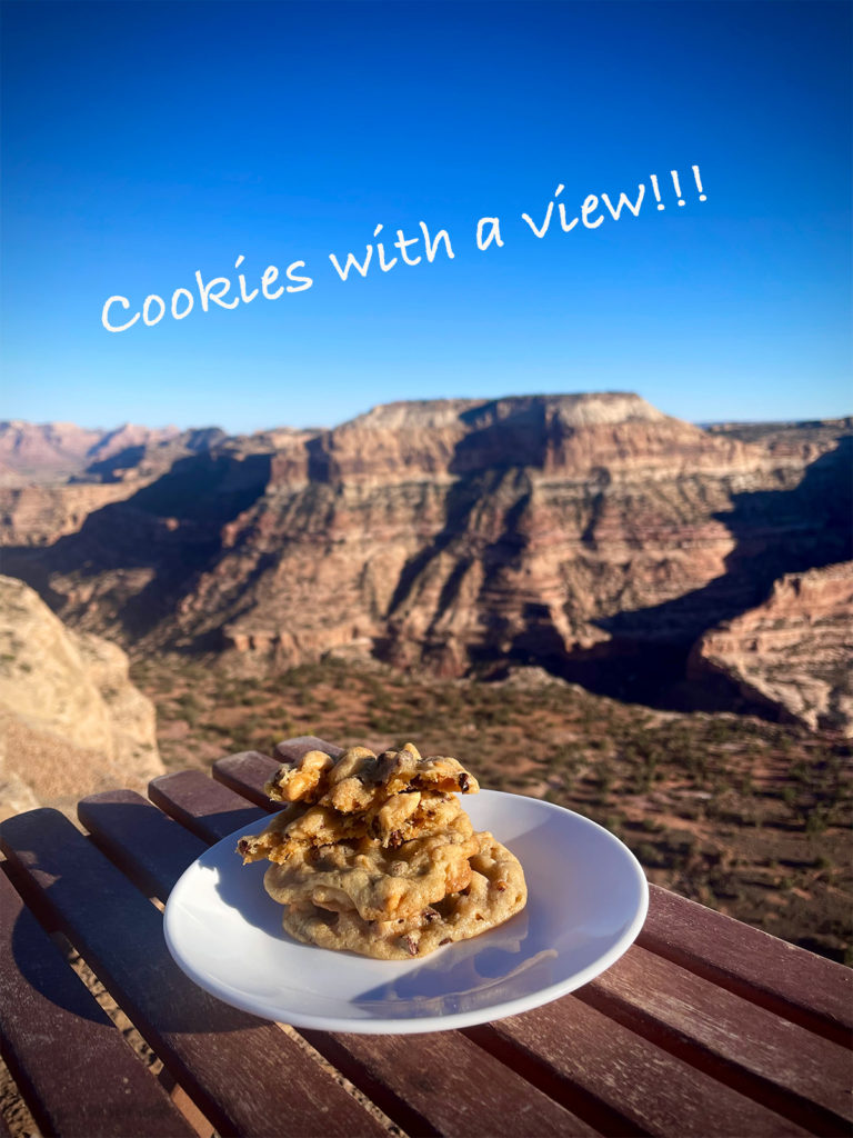 A plate of cookies sitting on a wood table with The Little Grand Canyon in the background.