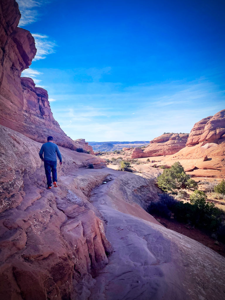 Hiking to Delicate Arch in Arches National Park, Utah.