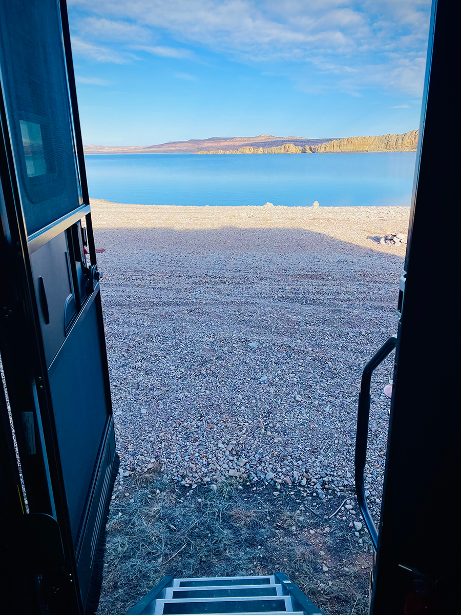 Looking out the front door of our RV at Flaming Gorge reservoir.