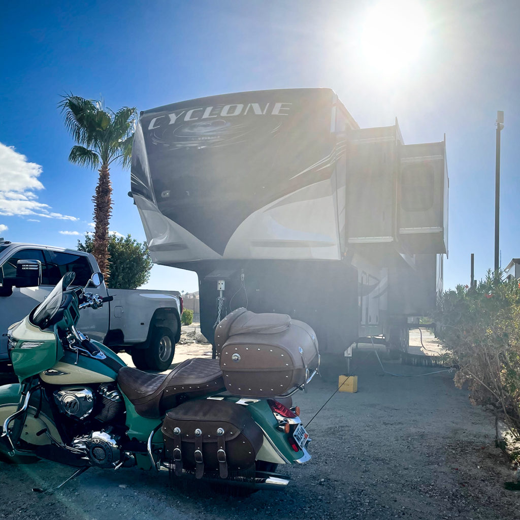 Our RV, truck and motorcycle parked at an RV park in Desert Hot Springs, California.