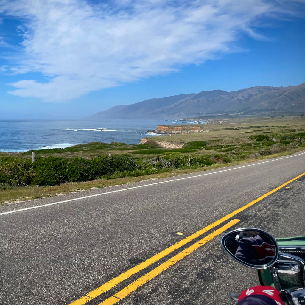 Riding the motorcycle along the California coast.