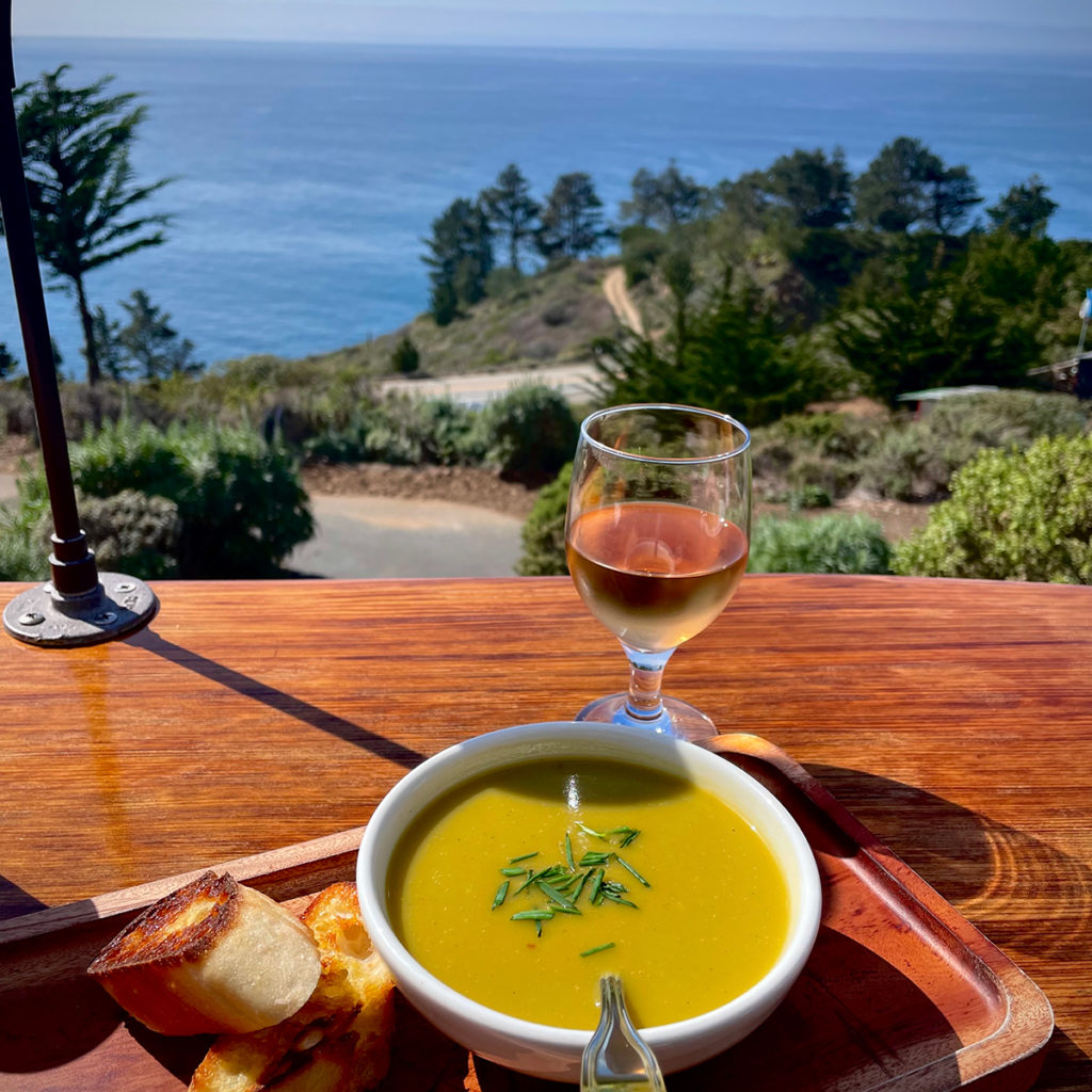 Eating lunch outside with a view of the ocean at Tree Bones Resort in Bug Sur, California.