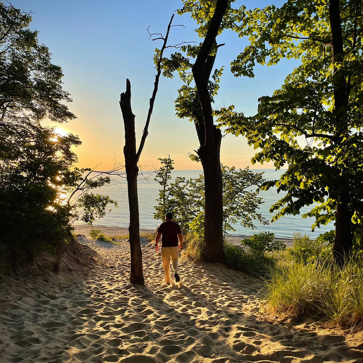 Steve walking onto the beach at Indiana Dunes State Park.