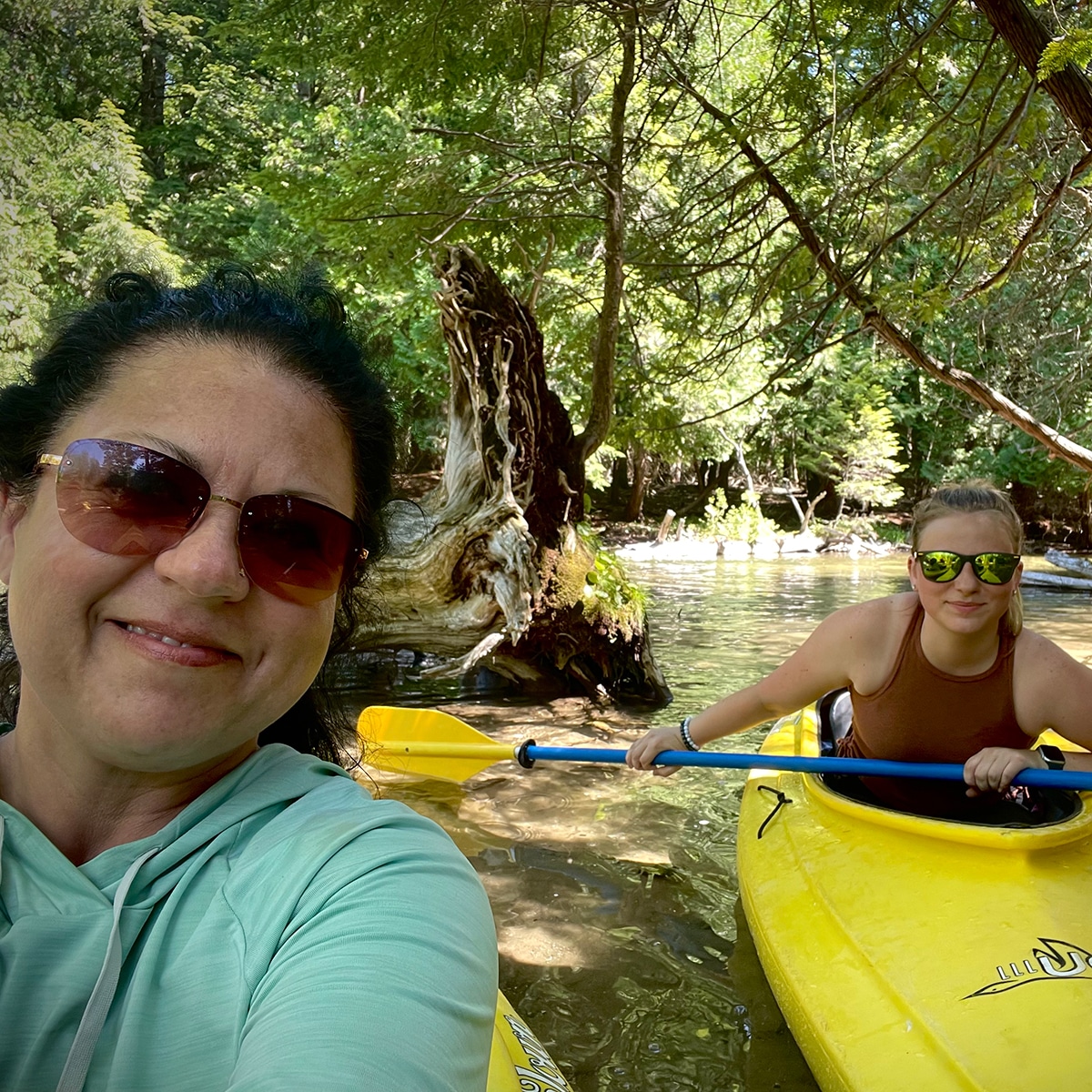 Me and my niece kayaking down the Crystal River in Glen Arbor Michigan.
