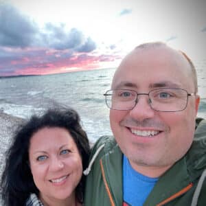Steve and I at Sunset Beach in Petoskey with a brilliant sunset over the water behind us.