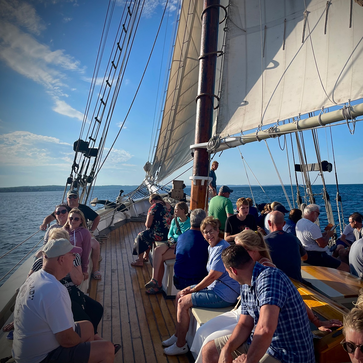 A view from the deck of the Tall Ship Manitou sailboat while sailing in Traverse Bay, Michigan.