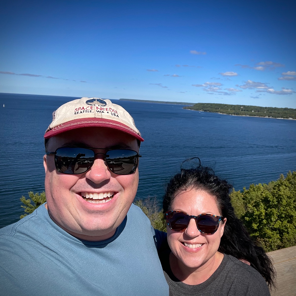 Steve and Rebecca Blackwell standing on a lookout in Peninsula State Park in Door County, Wisconsin.
