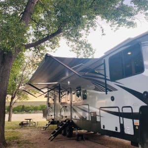 Our 5th wheel RV parked next to Lake Ogallala in Nebraska.