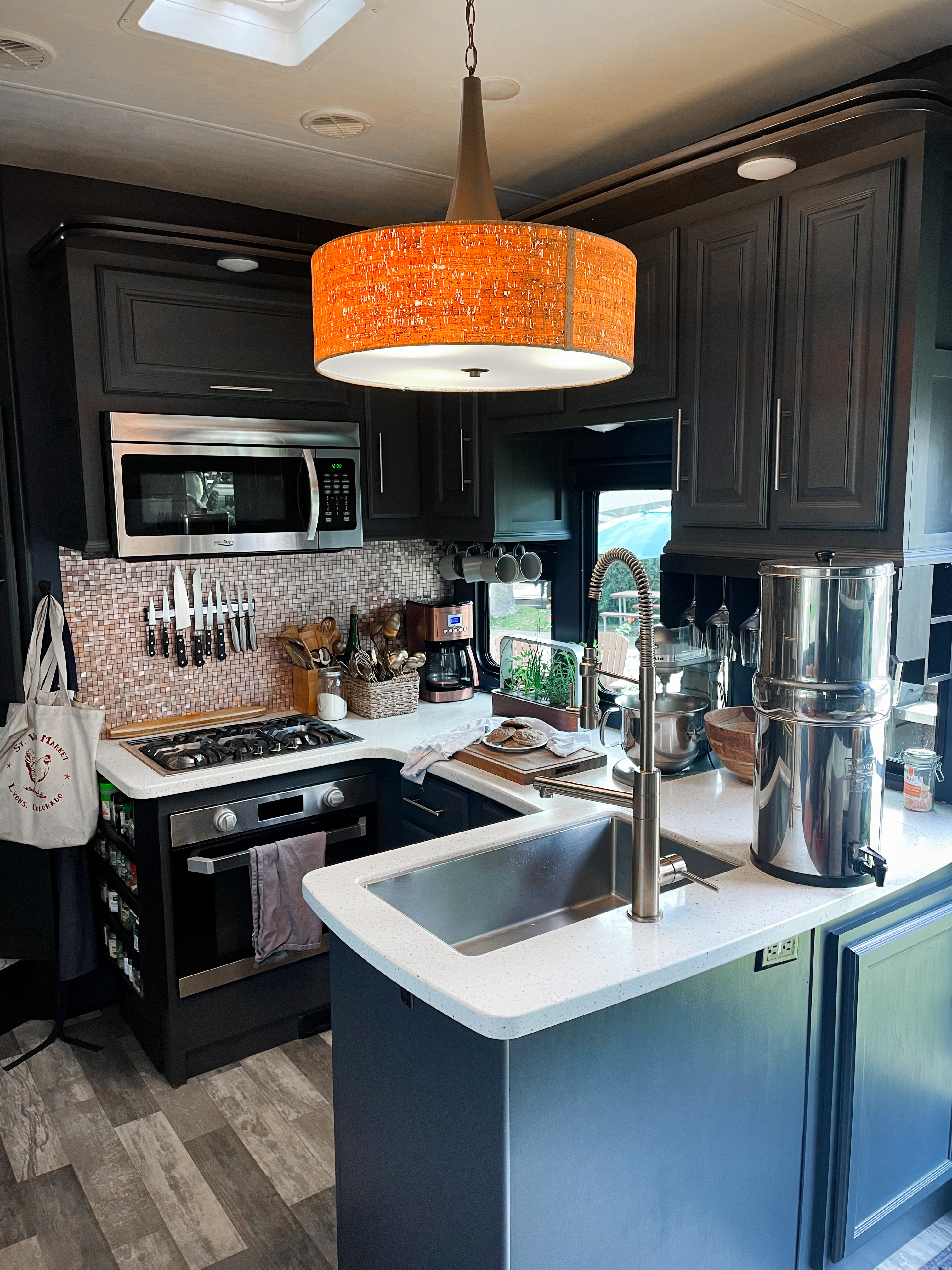 The renovated kitchen inside our 5th wheel RV.