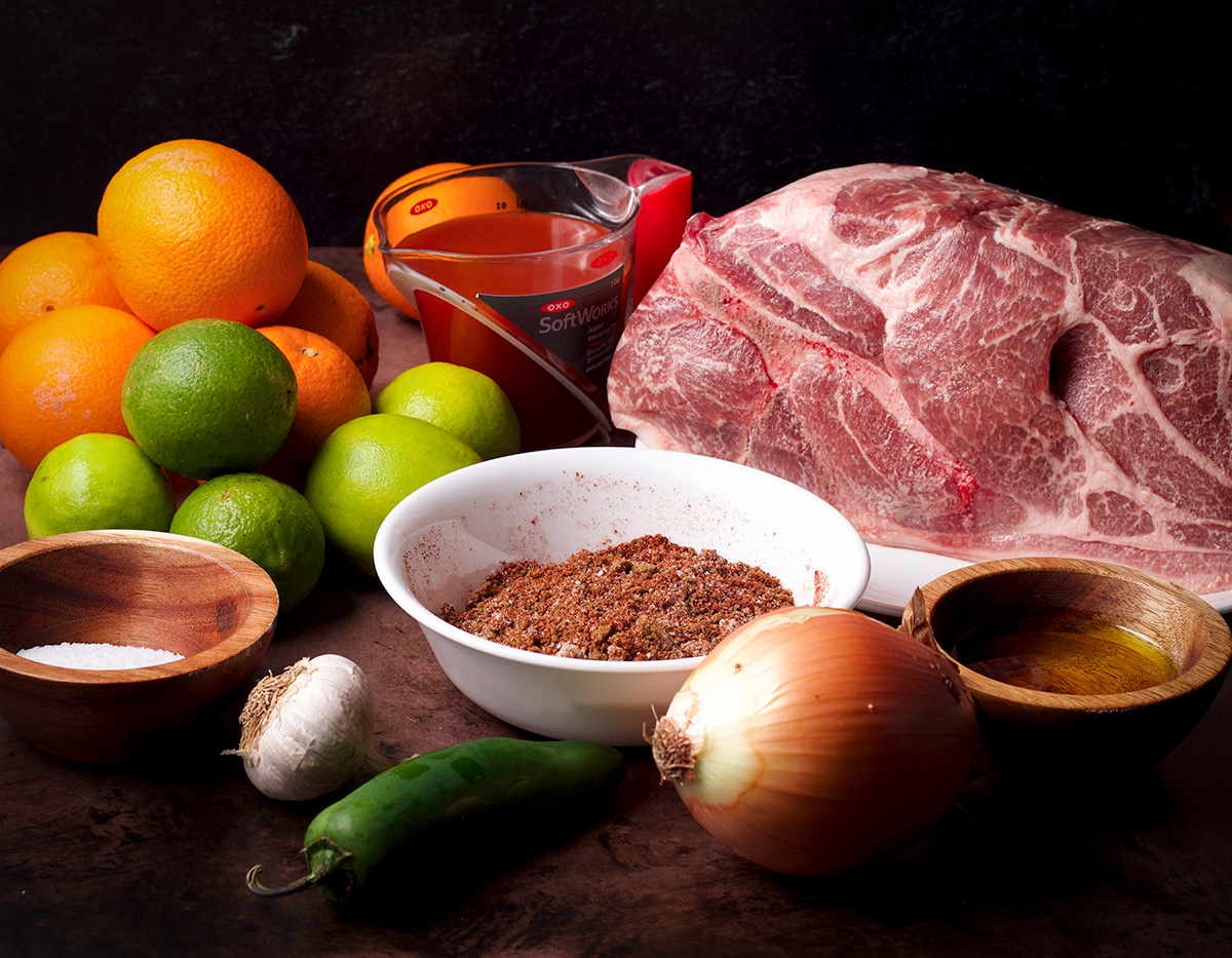 All the ingredients you need to make shredded pork tacos.